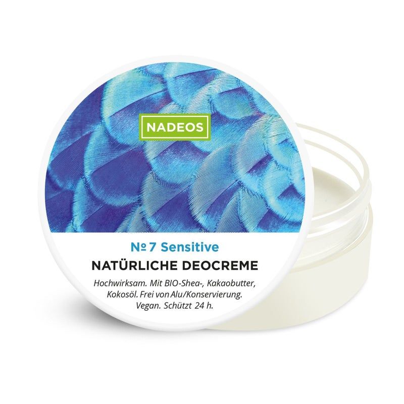 Crema deodorante in vasetto trasparente. Sul coperchio: marchio NADEOS, grafica piume blu, nome prodotto e altre informazioni.
