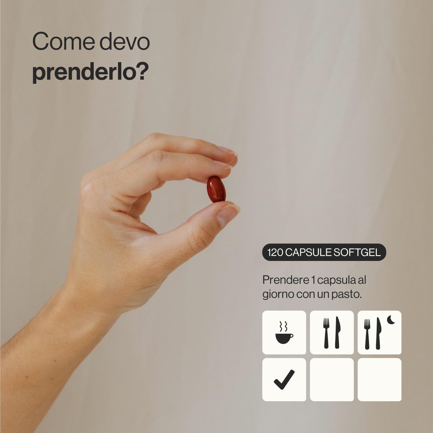 Mano che tiene una capsula. Scritta: 120 capsule. Assunzione: 1 capsula al giorno con un pasto.