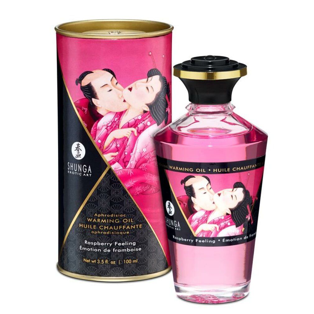 Olio da massaggio al lampone con confezione. Bottiglia e scatola con illustrazioni. Scritta: Shunga, Warming Oil.