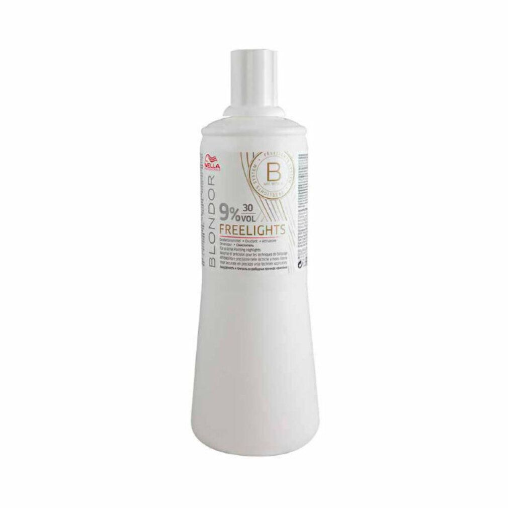 Flacone bianco Wella Blondor Freelights 9%. Etichetta con testo e logo. Su sfondo bianco.
