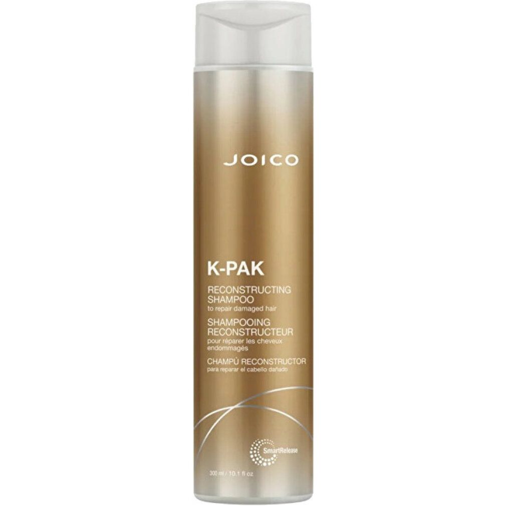 Flacone dorato JOICO K-PAK Reconstructing Shampoo per capelli danneggiati.