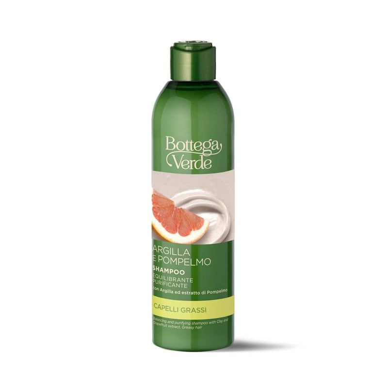 Flacone verde di shampoo. Scritta: Bottega Verde, Argilla e Pompelmo. Immagine di pompelmo e argilla.