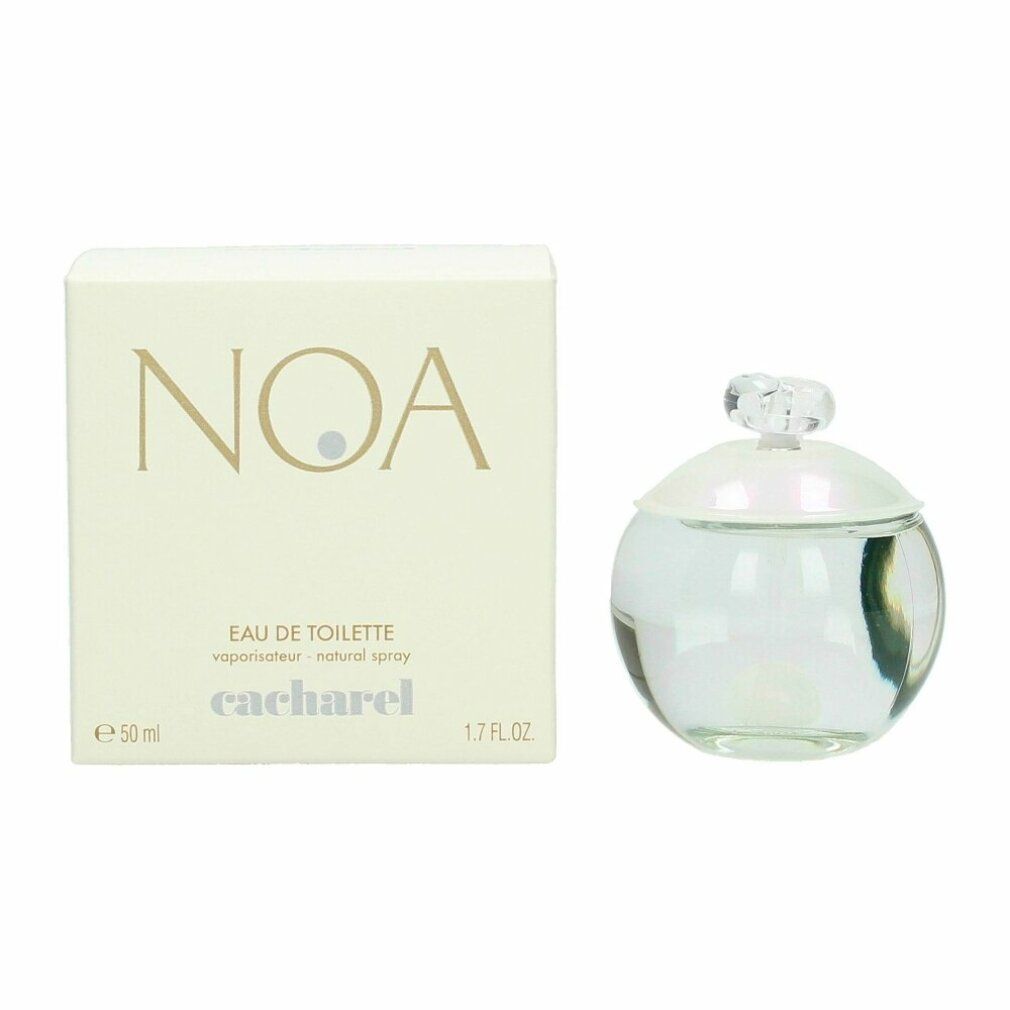 Scatola bianca e flacone rotondo in vetro. Sulla scatola, "NOA", "EAU DE TOILETTE" e "cacharel". Flacone con contenuto iridescente.