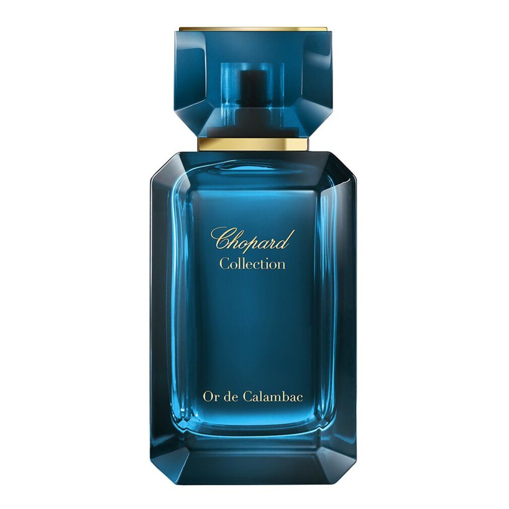Flacone Chopard Collection Or de Calambac Eau de Parfum in vetro blu con accento dorato.
