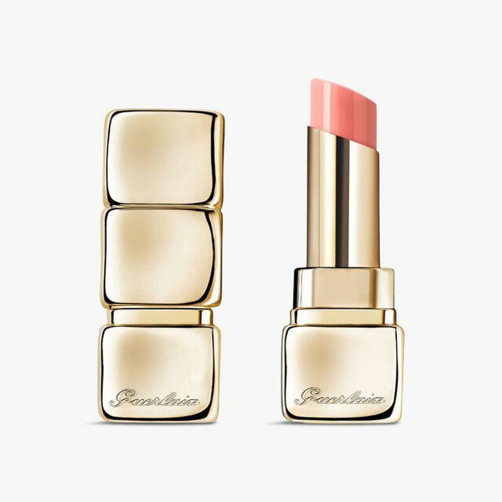 Due rossetti dorati. Uno chiuso, l'altro aperto con rossetto rosa. Marchio Guerlain.