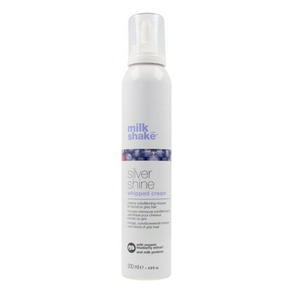 Flacone spray bianco con "milk shake silver shine whipped cream". Accenti blu e rossi. Contenuto 200 ml.
