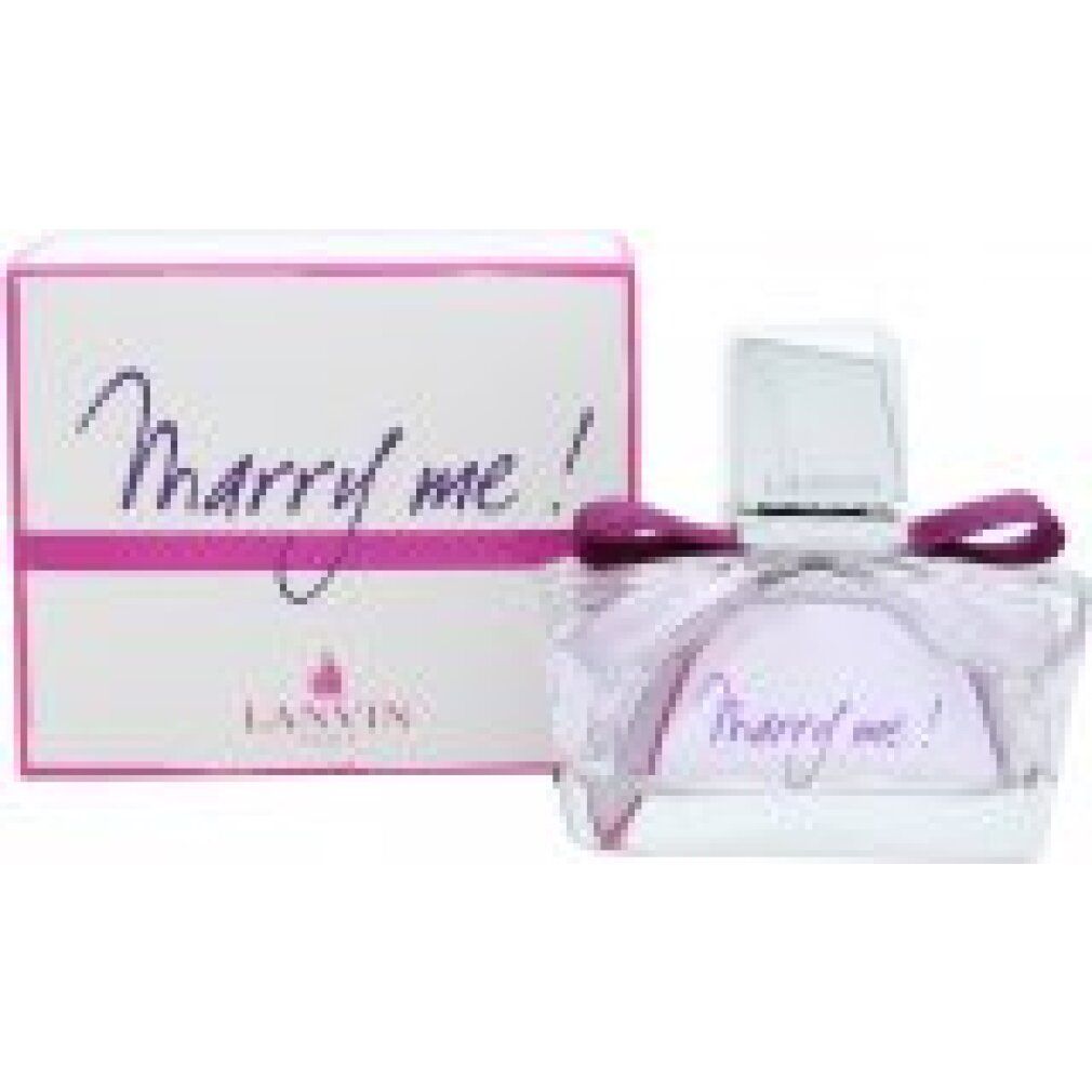 Flacone di profumo con confezione. Flacone con liquido viola, tappo argentato e fiocco. Scritta "Marry me!".