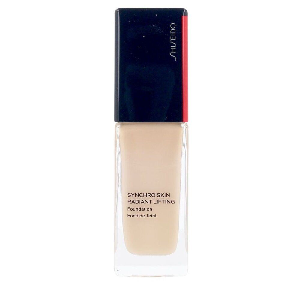 Flacone Shiseido Synchro Skin Radiant Lifting Foundation. Forma rettangolare, base trasparente, tappo nero con accento rosso. Testo.