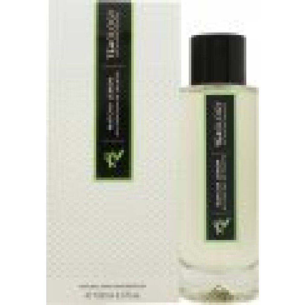 Flacone e confezione. Flacone con tappo nero, etichetta con testo. Confezione con logo e testo. Nome del prodotto non visibile.