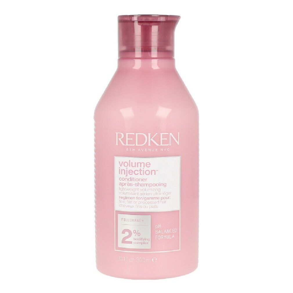 Flacone rosa con tappo rosso. Scritta: Redken Volume Injection Conditioner. 2% Filloxane.