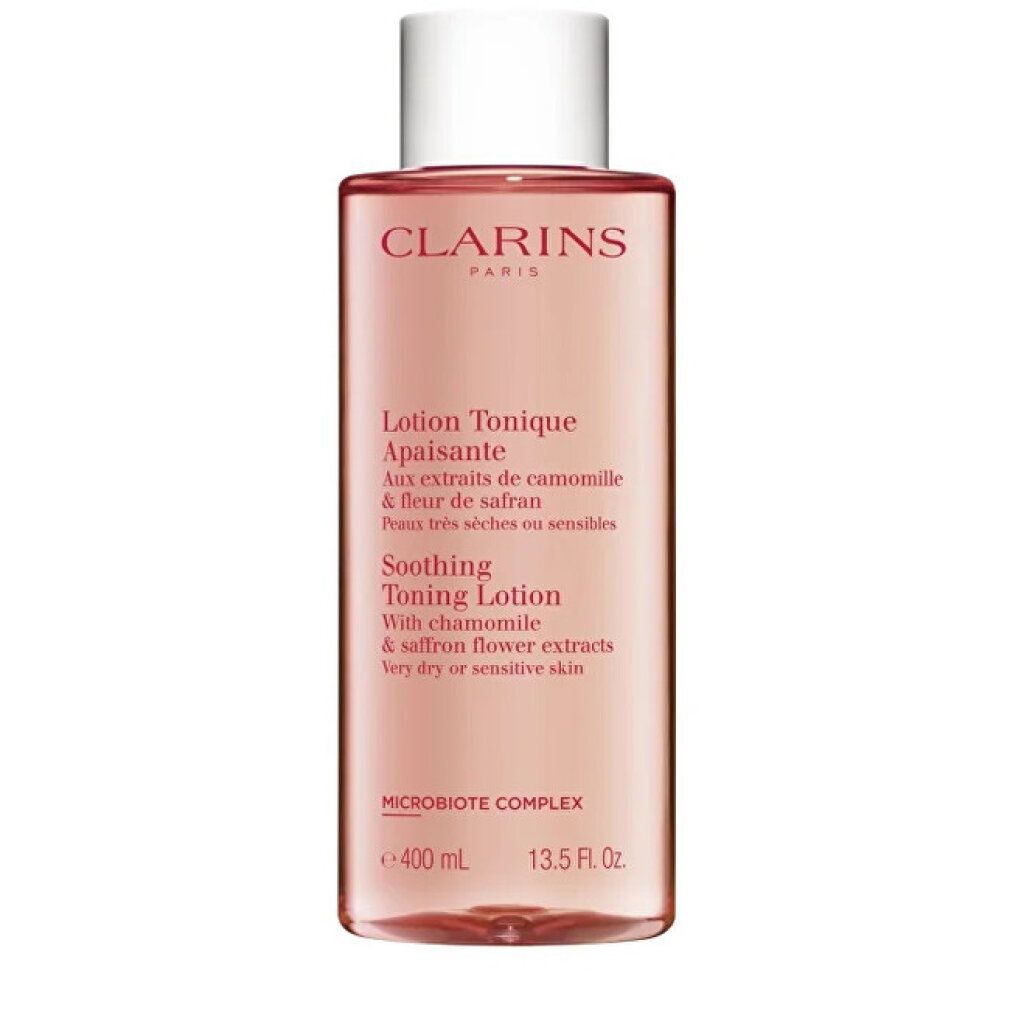 Flacone rosa con tappo bianco. Scritte: CLARINS, Lotion Tonique Apaisante, 400 ml, 13.5 Fl. Oz. Testo in francese e inglese.
