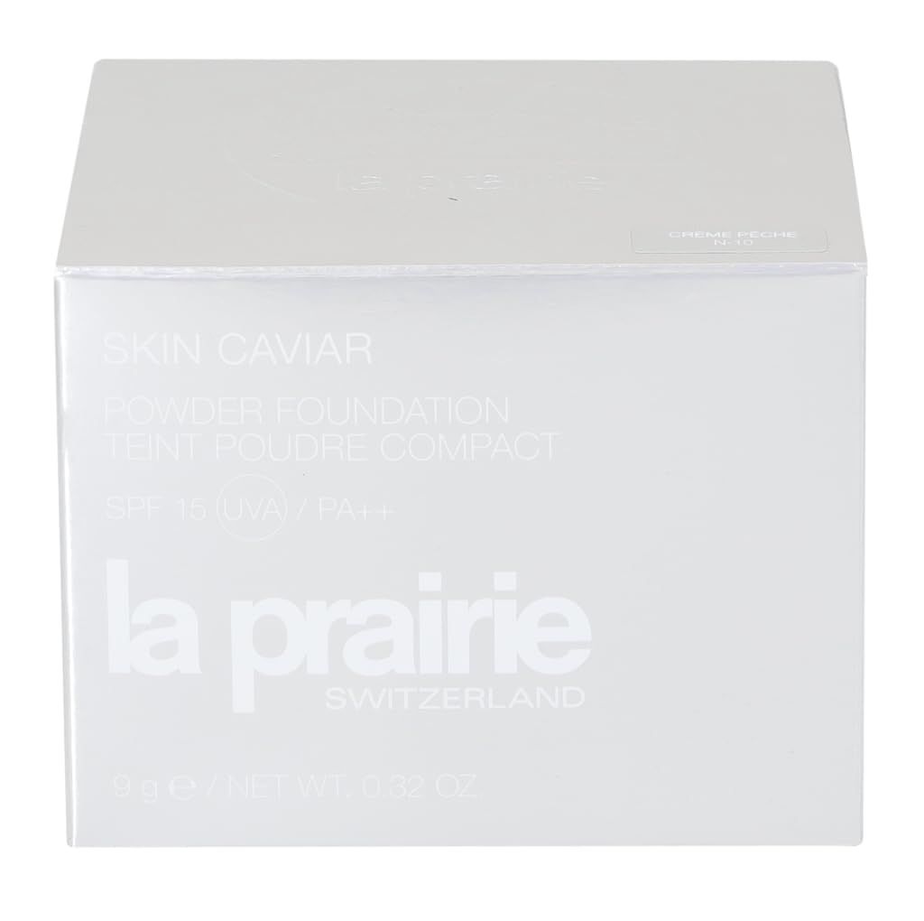 Confezione cosmetica bianca. Scritte: Skin Caviar, Powder Foundation, SPF 15, La Prairie, Switzerland. Contenuto non visibile.