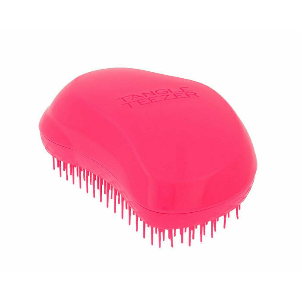Spazzola per capelli rosa con setole. Il testo TANGLE TEEZER è visibile sulla parte superiore.