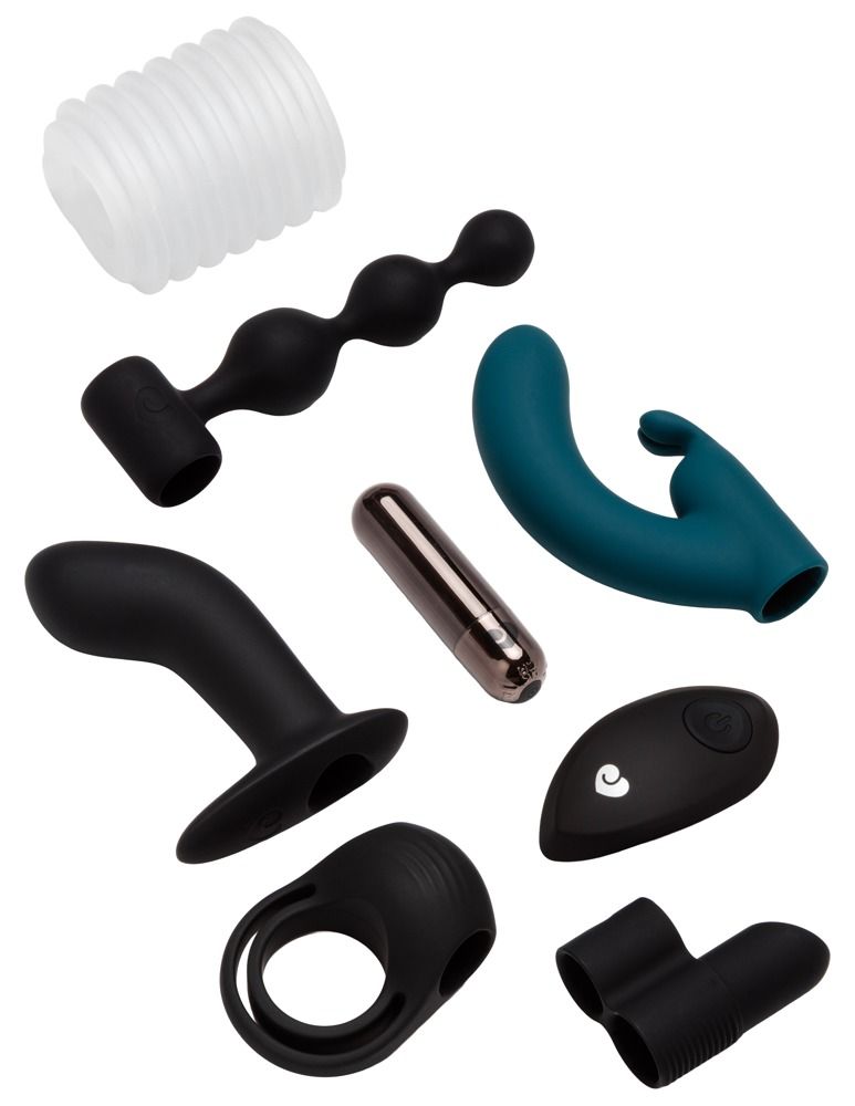 Un vibratore nero con impugnatura a coste, un vibratore turchese, un vibratore a bacchetta argentato.