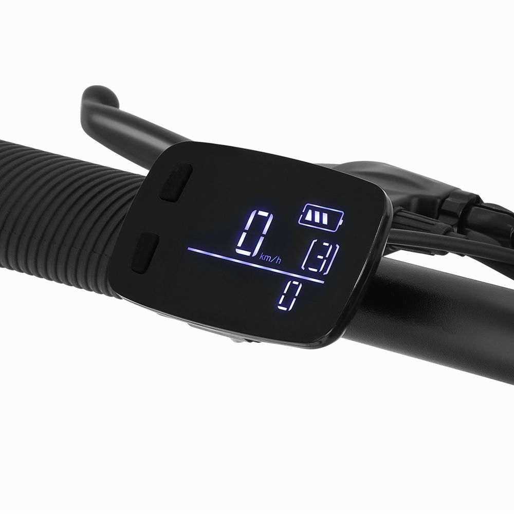 Display digitale con velocità, stato della batteria e marcia. Sfondo nero, cifre bianche. Pulsanti.