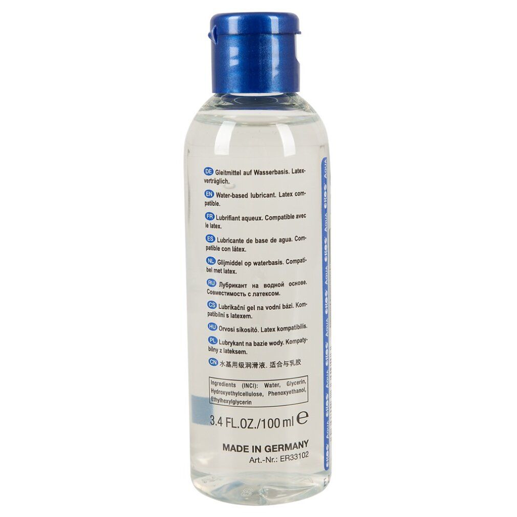 Retro di un flacone trasparente con tappo blu. Informazioni multilingue sul prodotto.