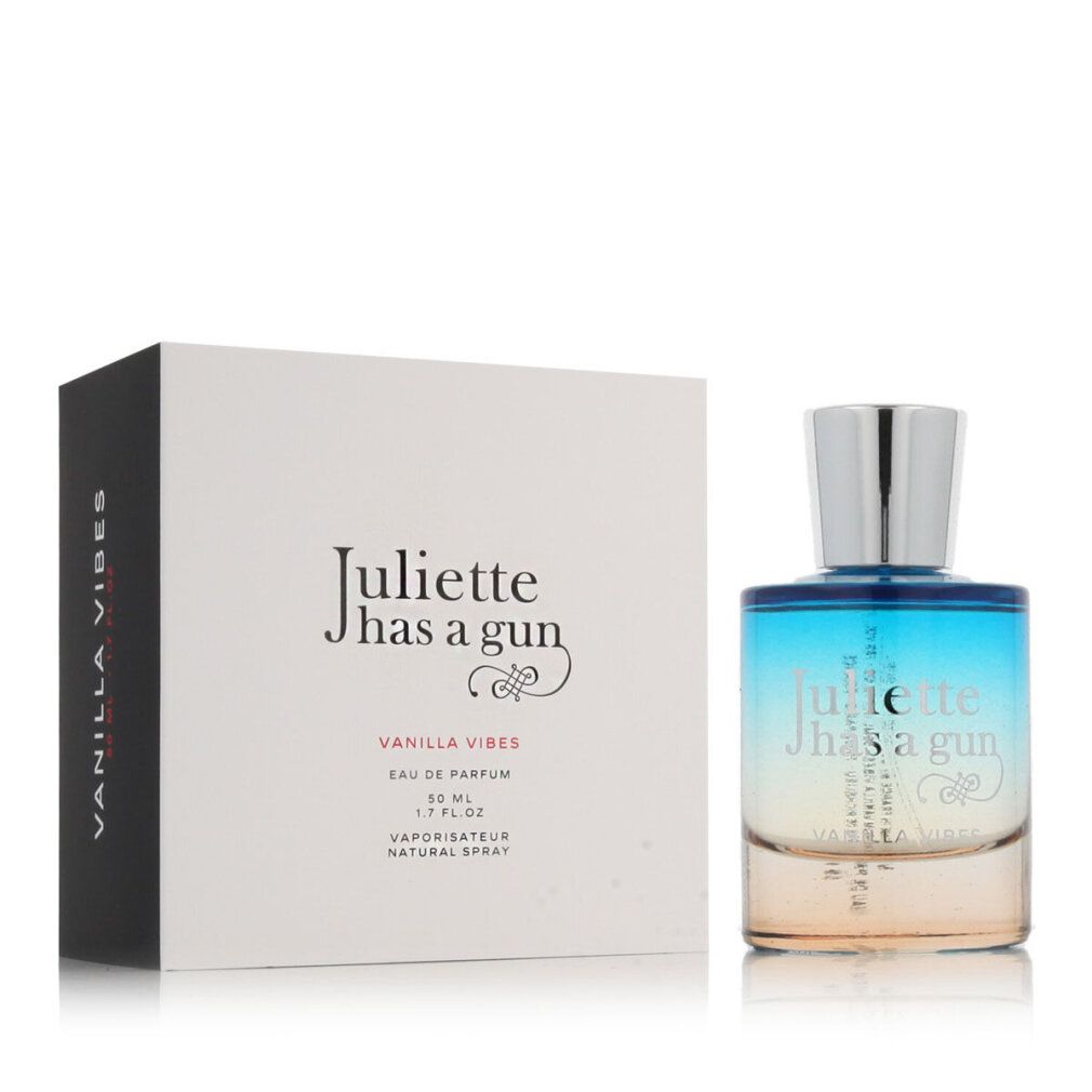 Flacone di profumo e confezione. Flacone con sfumatura blu-gialla. Confezione con logo del marchio e nome del prodotto.