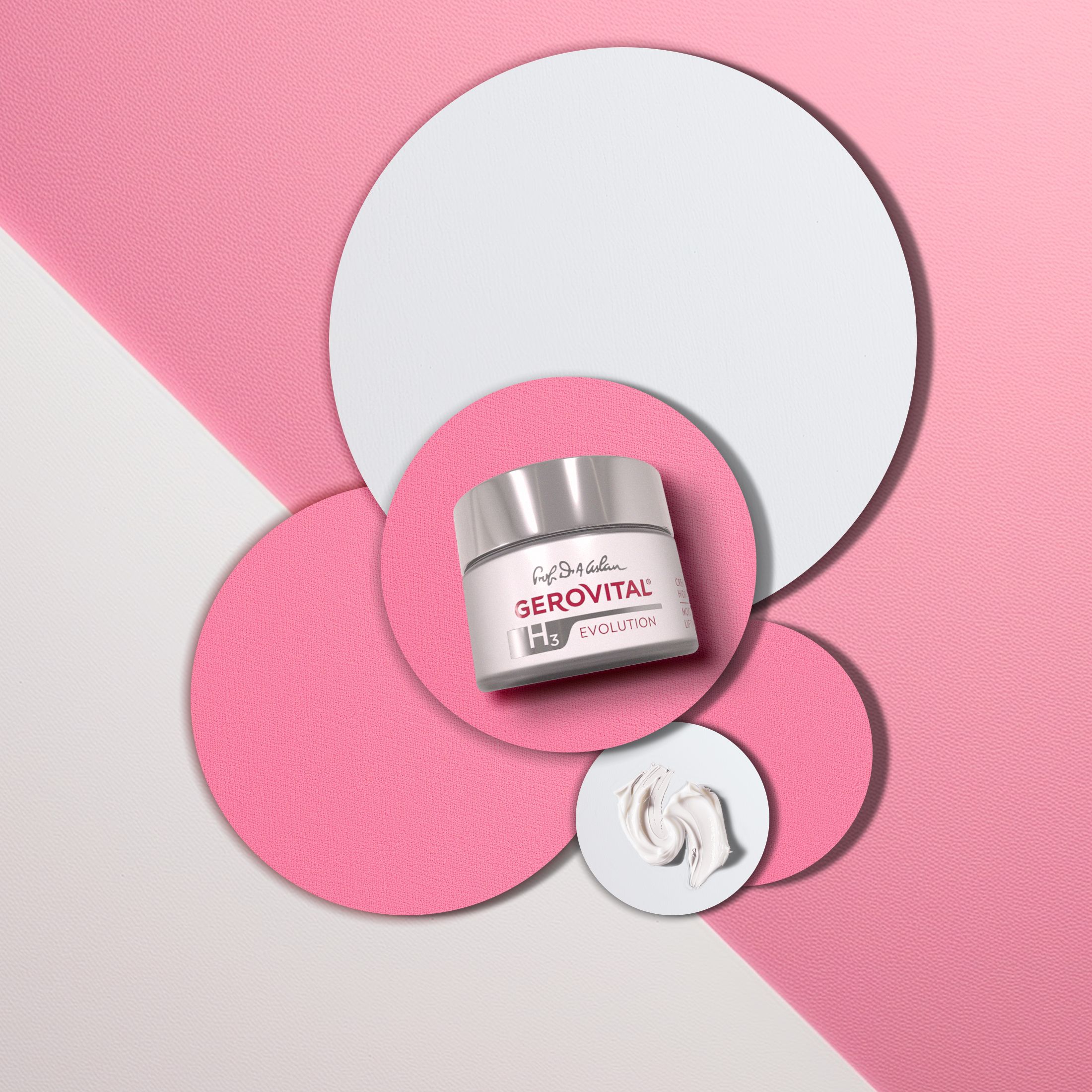 Vasetto di crema e macchia di crema su sfondo colorato. Scritta: Gerovital H3 Evolution.