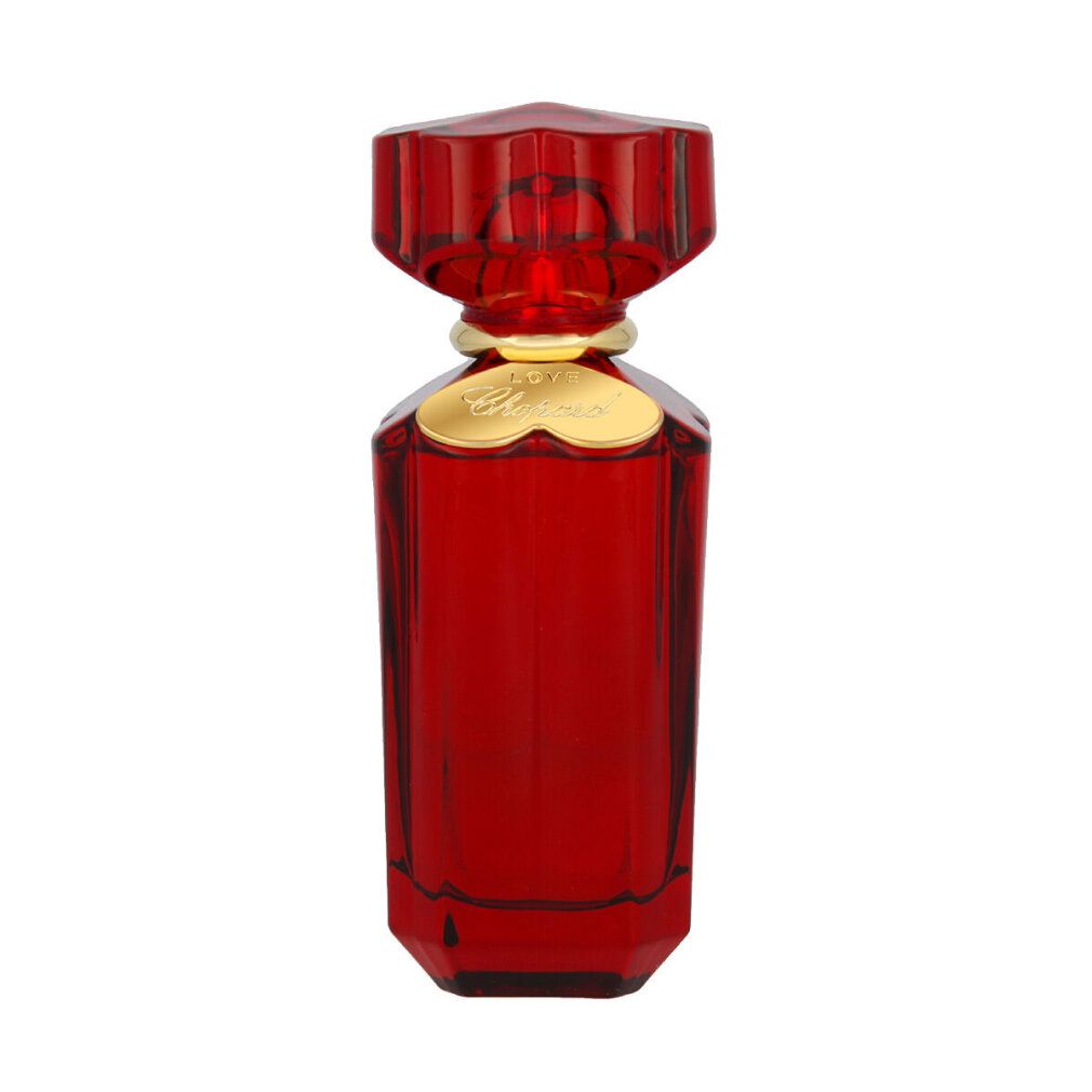 Flacone rosso con tappo dorato. Scritta: Love Chopard. Forma geometrica.
