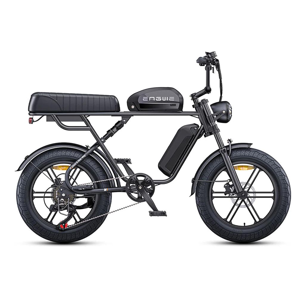 E-bike nera. Visibile: telaio, sella, batteria, faro, parafanghi. Nessuna persona.