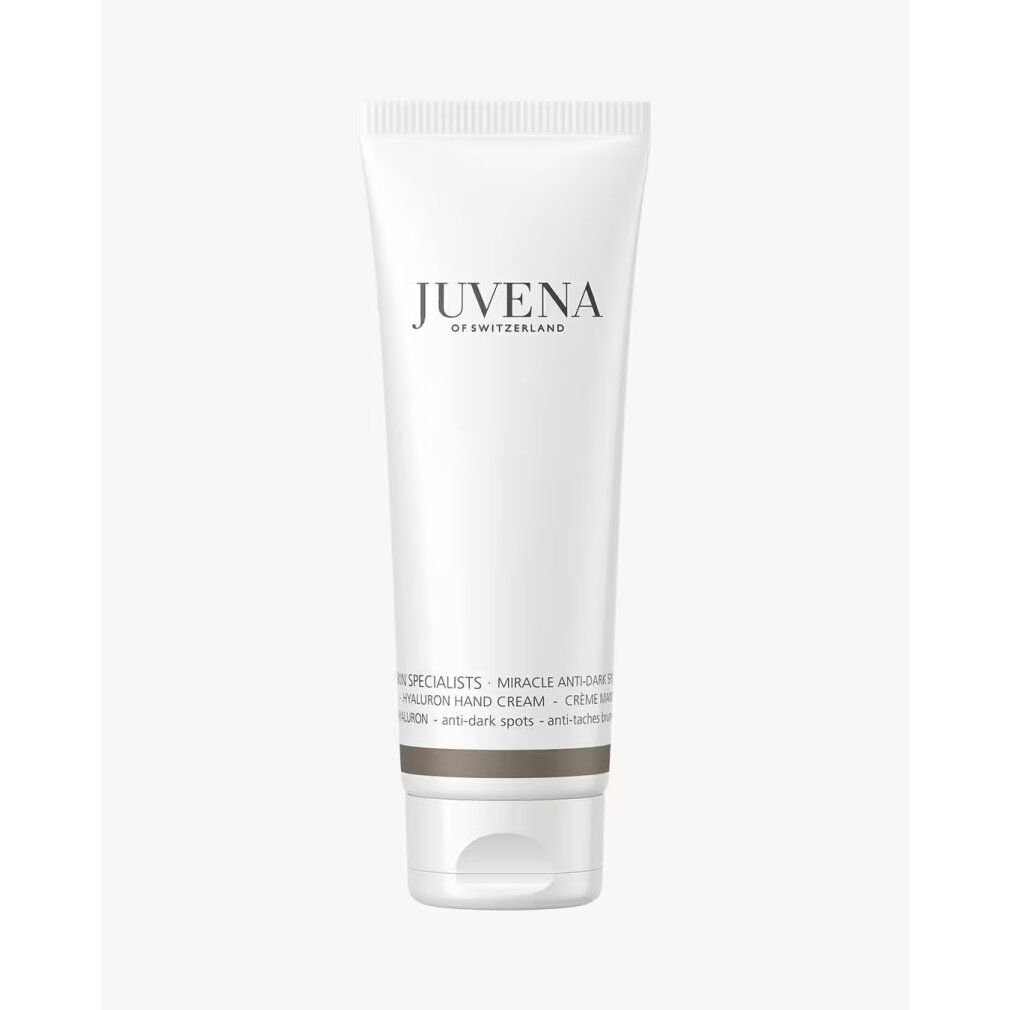 Tubo bianco con scritta JUVENA. Testo: MIRACLE ANTI-DARK SPOT HYALURON HAND CREAM. Anti-macchie.