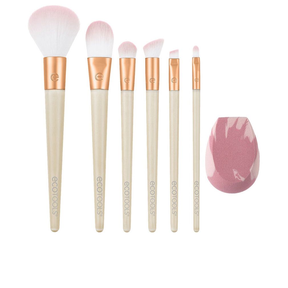 Set di 7 pennelli trucco e una spugna. Pennelli con manici color crema, ghiera dorata e setole rosa. Spugna rosa e bianca.