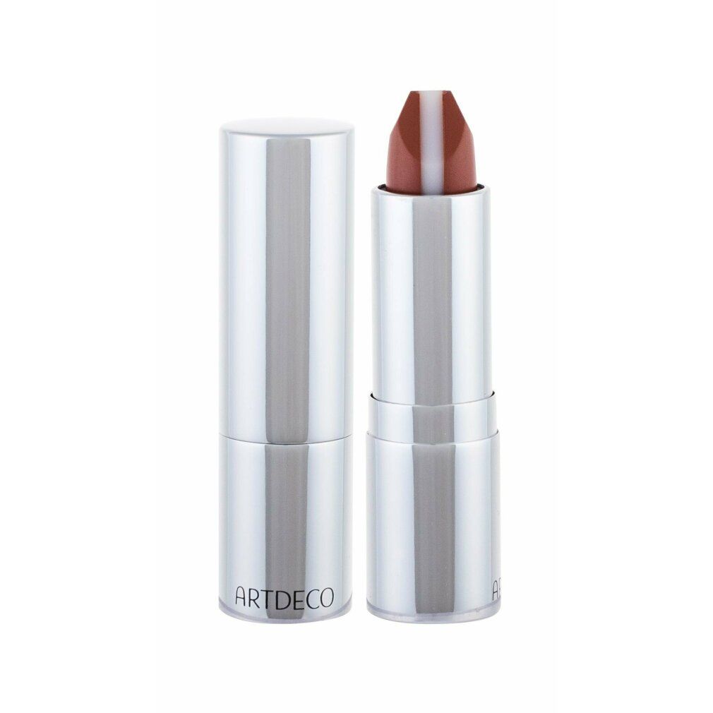 Rossetto con astuccio argentato. Il rossetto è aperto, mostrando un colore marrone con una striscia bianca al centro. Il testo ARTDECO è visibile.