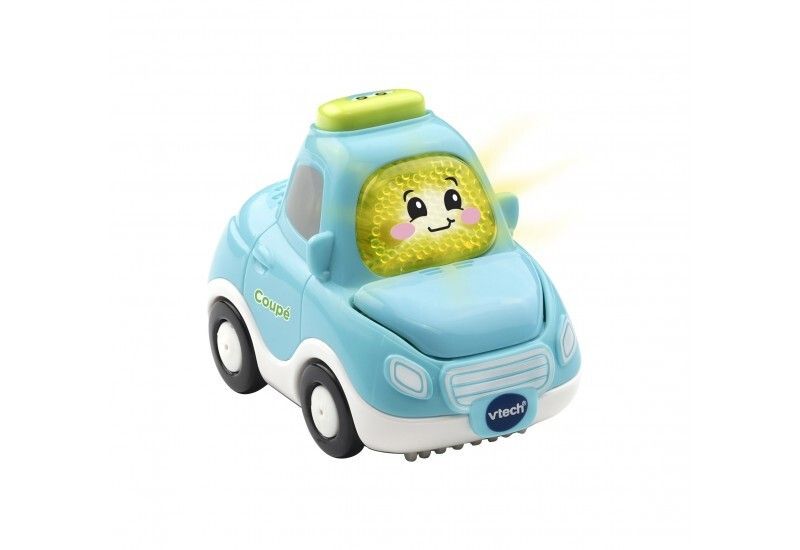 Coupé giocattolo blu con ruote nere e volto giallo. Logo Vtech visibile.