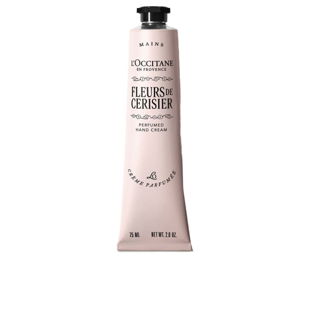 Tubo di crema mani rosa con tappo nero. Scritta: Fleurs de Cerisier, L'Occitane en Provence. In basso: 75 ml, Net Wt 2.6 OZ.