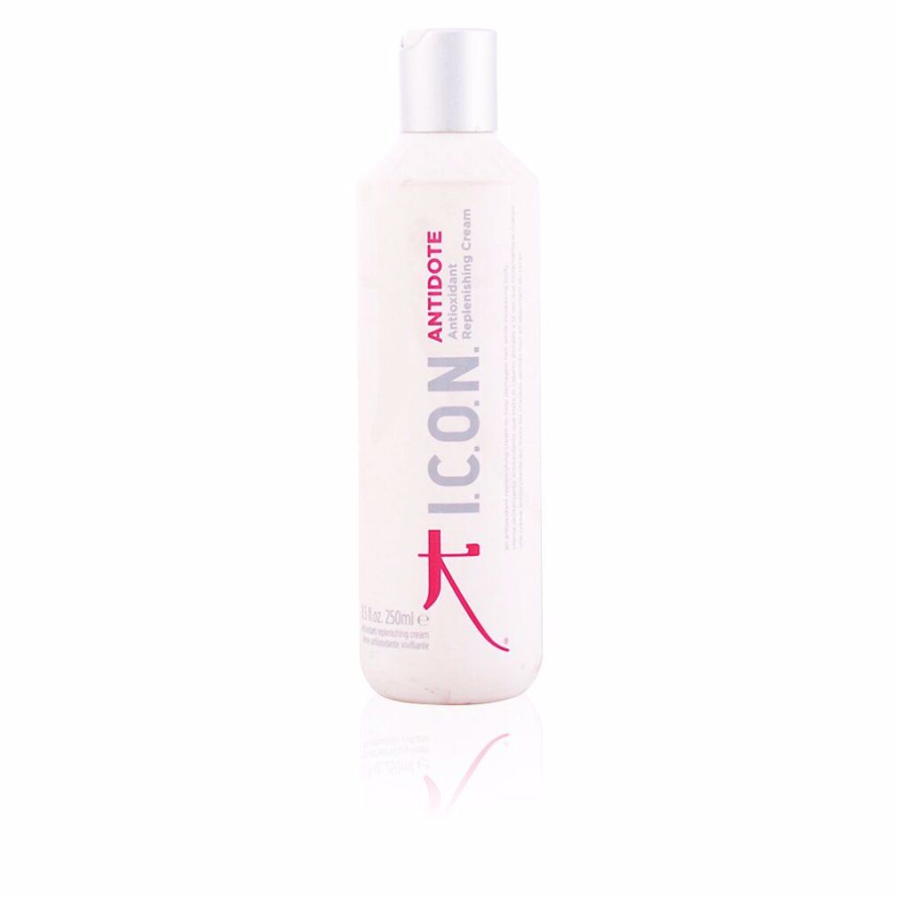 Flacone bianco con tappo bianco. Scritta: I.C.O.N. Antidote Antioxidant Replenishing Cream. Scritta e logo rossi.