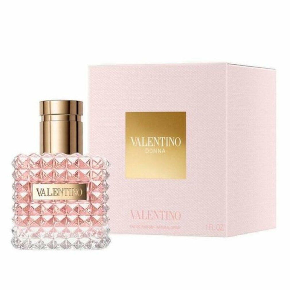 Flacone e confezione. Flacone quadrato, tappo dorato, scritta VALENTINO. Liquido rosa. Confezione rosa con logo.