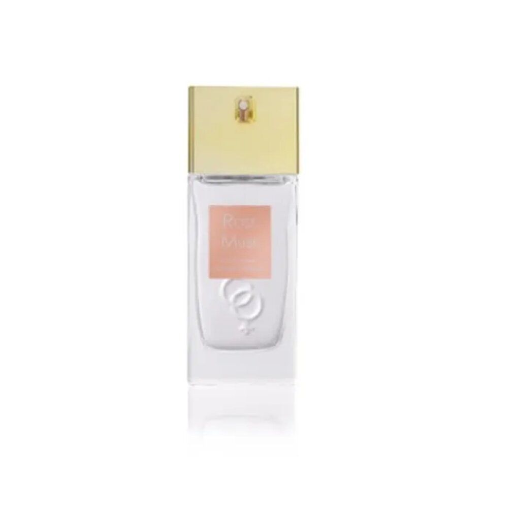 Flacone di profumo con tappo dorato. L'etichetta riporta "Rose Musk". Sotto l'etichetta sono raffigurati due anelli.