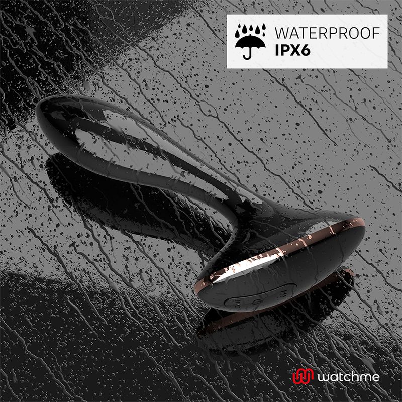 Vibratore nero su superficie bagnata. Impermeabile IPX6. Mostra il prodotto.