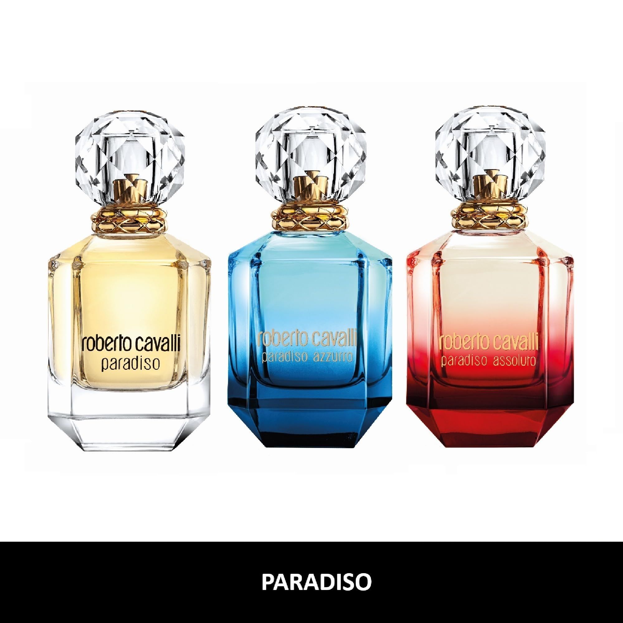 Tre flaconi di profumo Roberto Cavalli Paradiso. Tappi di cristallo, collane dorate, scritte dorate. Sfumature di colore: giallo, blu, rosso.