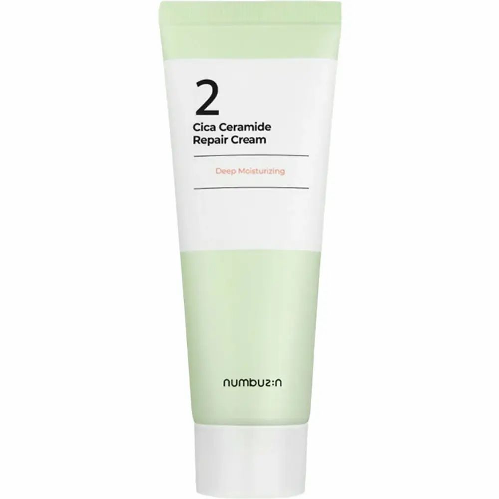 Tubo di crema con sezioni verdi e bianche. Scritta: "2 Cica Ceramide Repair Cream". Marchio: numbuz:n.