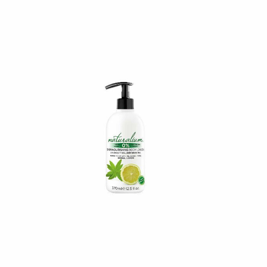 Flacone bianco con dispenser a pompa, lozione corpo Naturalium 0% con motivo limone e menta, 370ml.
