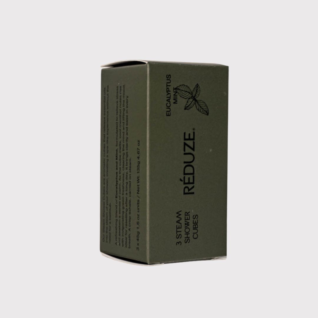 Scatola verde con testo e logo. Scritta: RÉDUZE, 3 Steam Shower Cubes, Eucalyptus Mint.