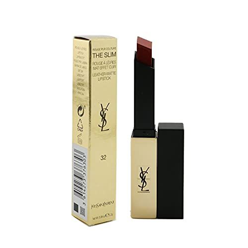 Rossetto dorato con cappuccio nero e confezione. La confezione riporta "Yves Saint Laurent The Slim".