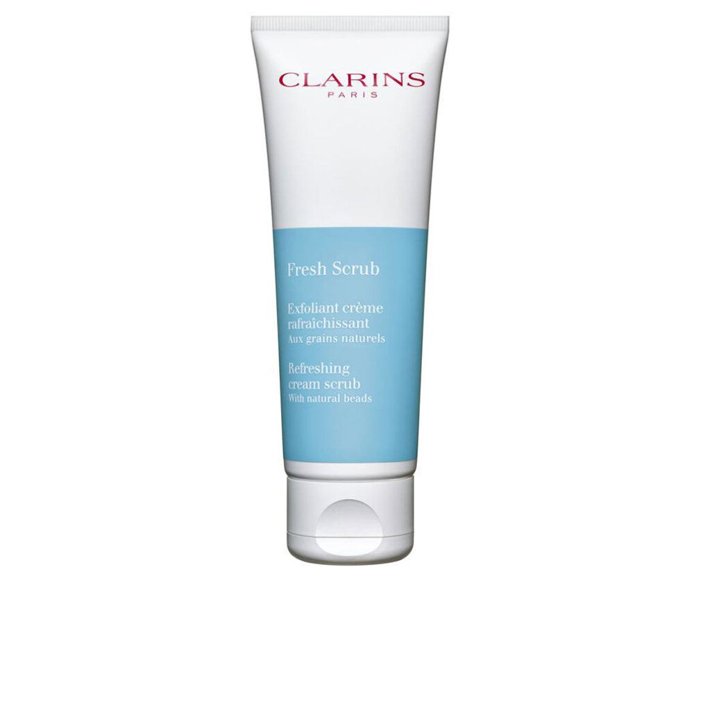 Tubo bianco con sezione centrale blu. Scritto Clarins Paris. Sotto, Fresh Scrub. Testo in francese e inglese.