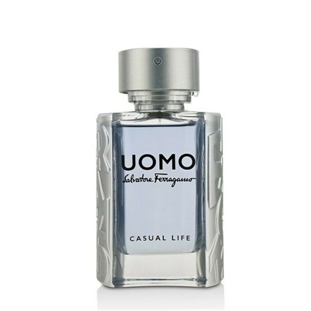 Flacone Uomo Casual Life Eau de Toilette. Forma rettangolare, tappo argentato. Testo: UOMO, Salvatore Ferragamo, Casual Life.