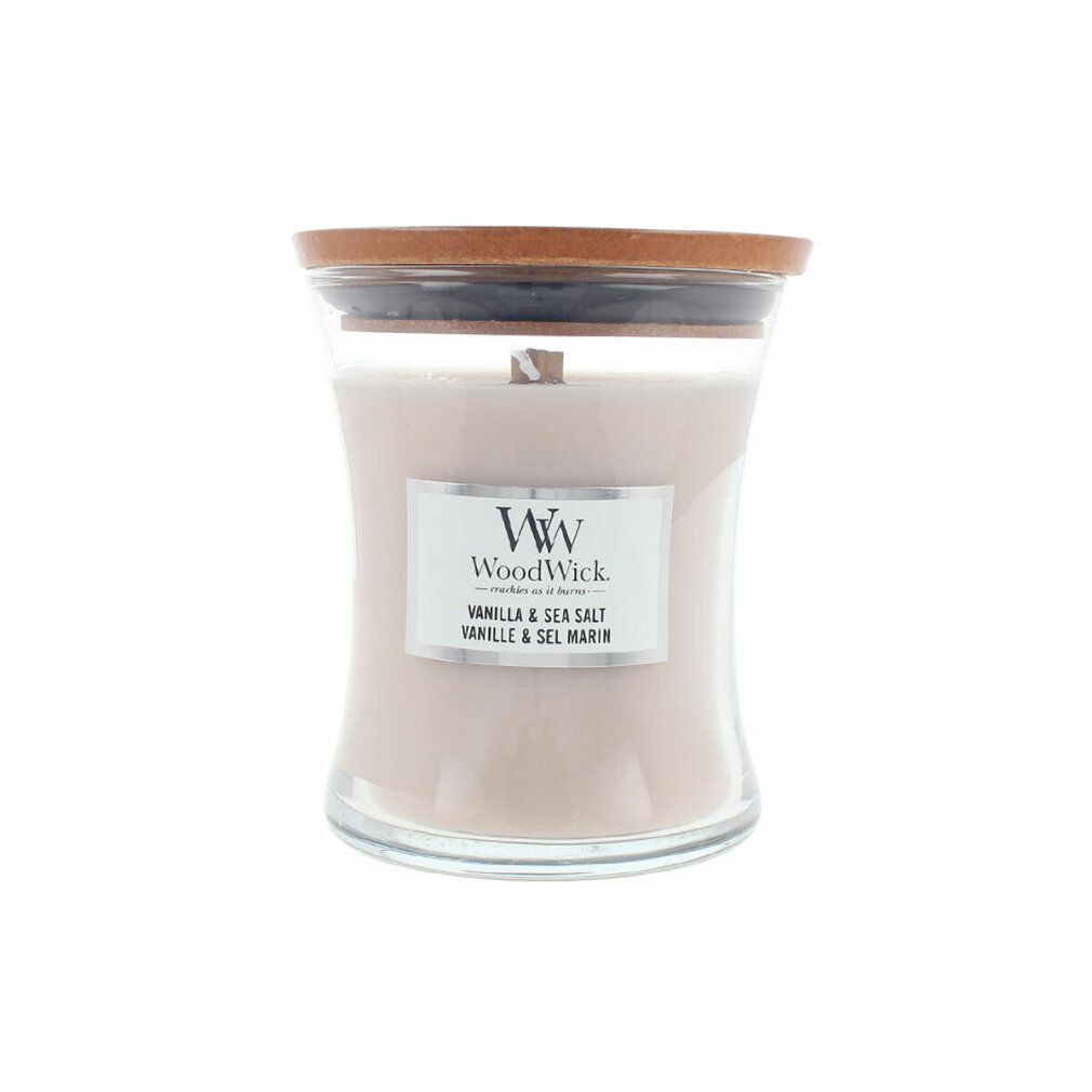 Candela a clessidra con coperchio. Etichetta "WoodWick Vanilla & Sea Salt".