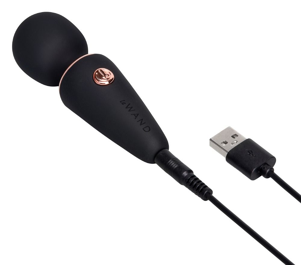 Vibratore nero con anello e pulsante oro rosa.