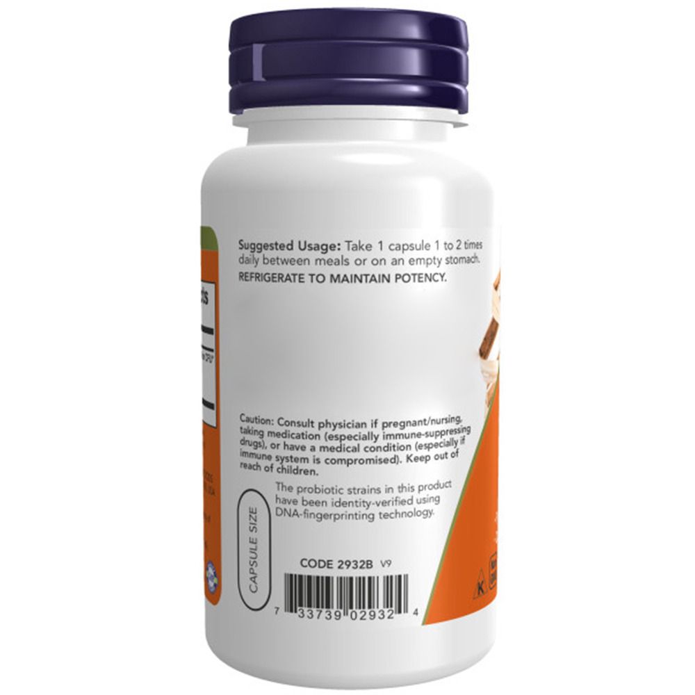 Flacone bianco di capsule con tappo viola. Etichetta con istruzioni e avvertenze.