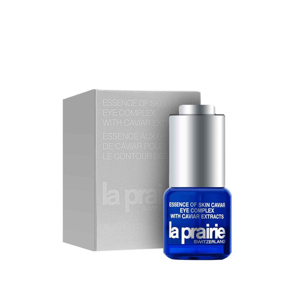 Flacone blu con tappo argentato e confezione bianca. Scritta: Essence of Skin Caviar Eye Complex, La Prairie.