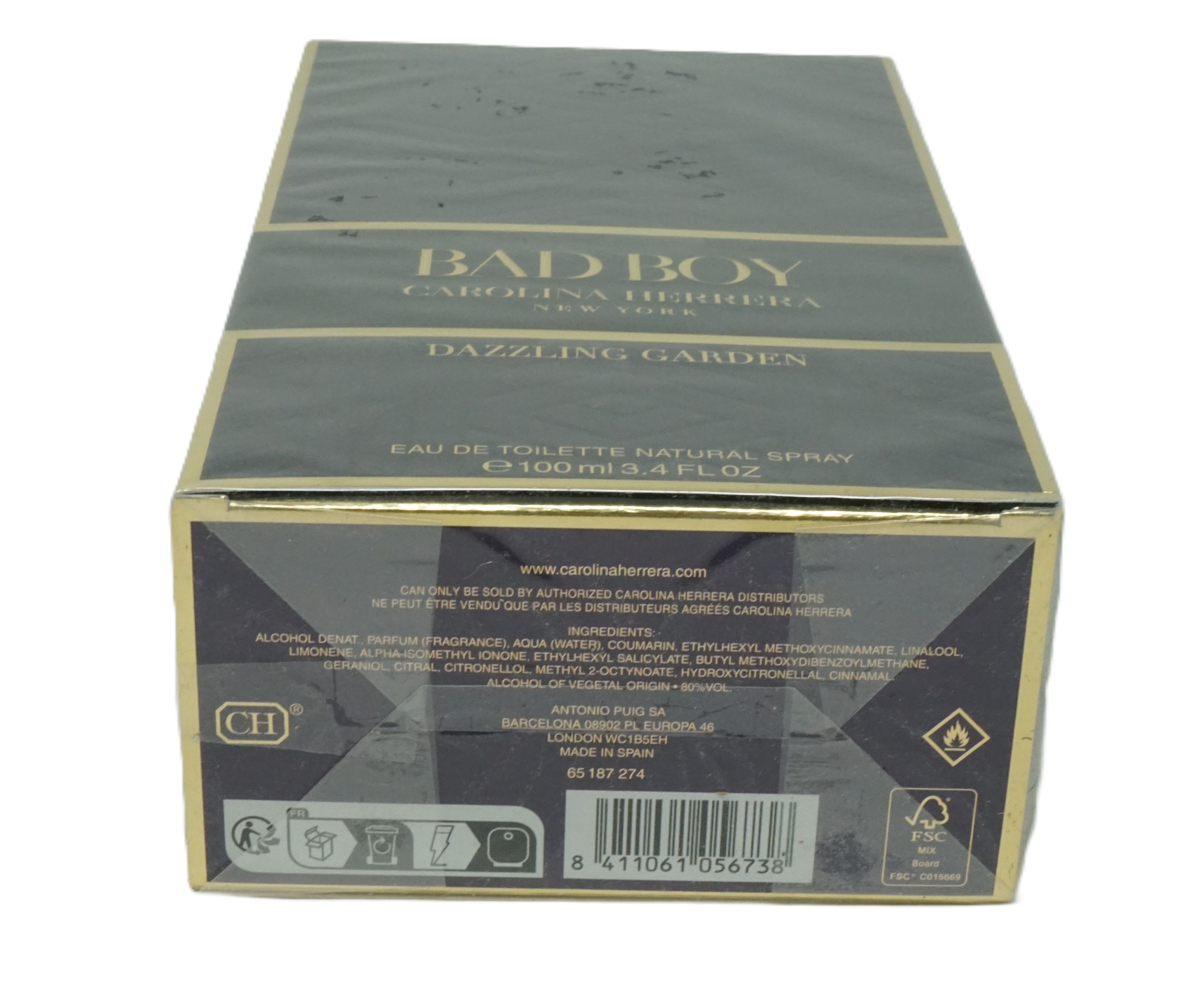 Scatola nera con dettagli dorati. Scritto: Bad Boy Dazzling Garden. E 100 ml 3.4 FL OZ.