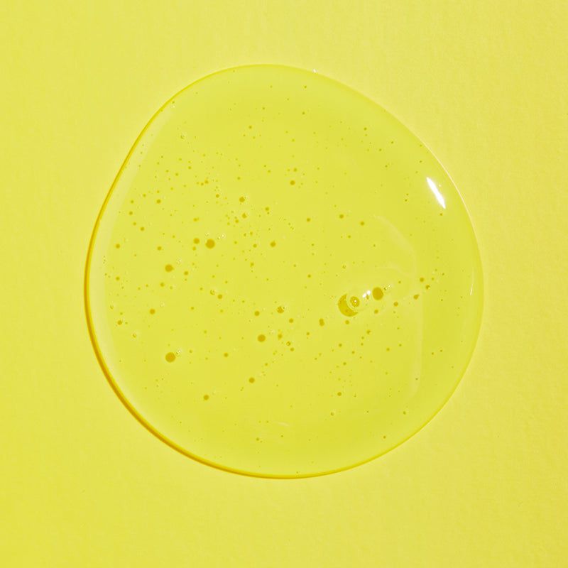 Gel su sfondo giallo. Gel con bolle. Giallo.