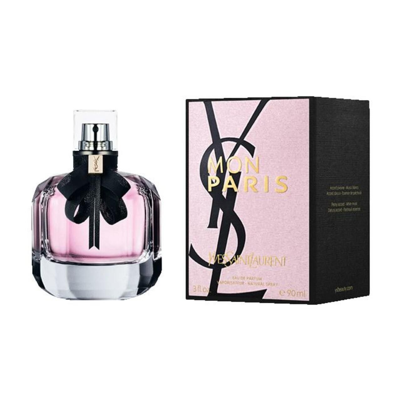 Flacone con fiocco nero e liquido rosa, accanto a una confezione con logo e scritta "Mon Paris".