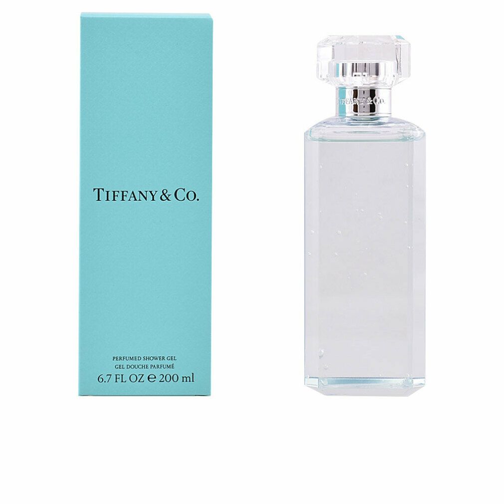 Flacone di gel doccia e scatola. Flacone rettangolare, trasparente, con tappo argentato. Scatola turchese, logo del marchio.