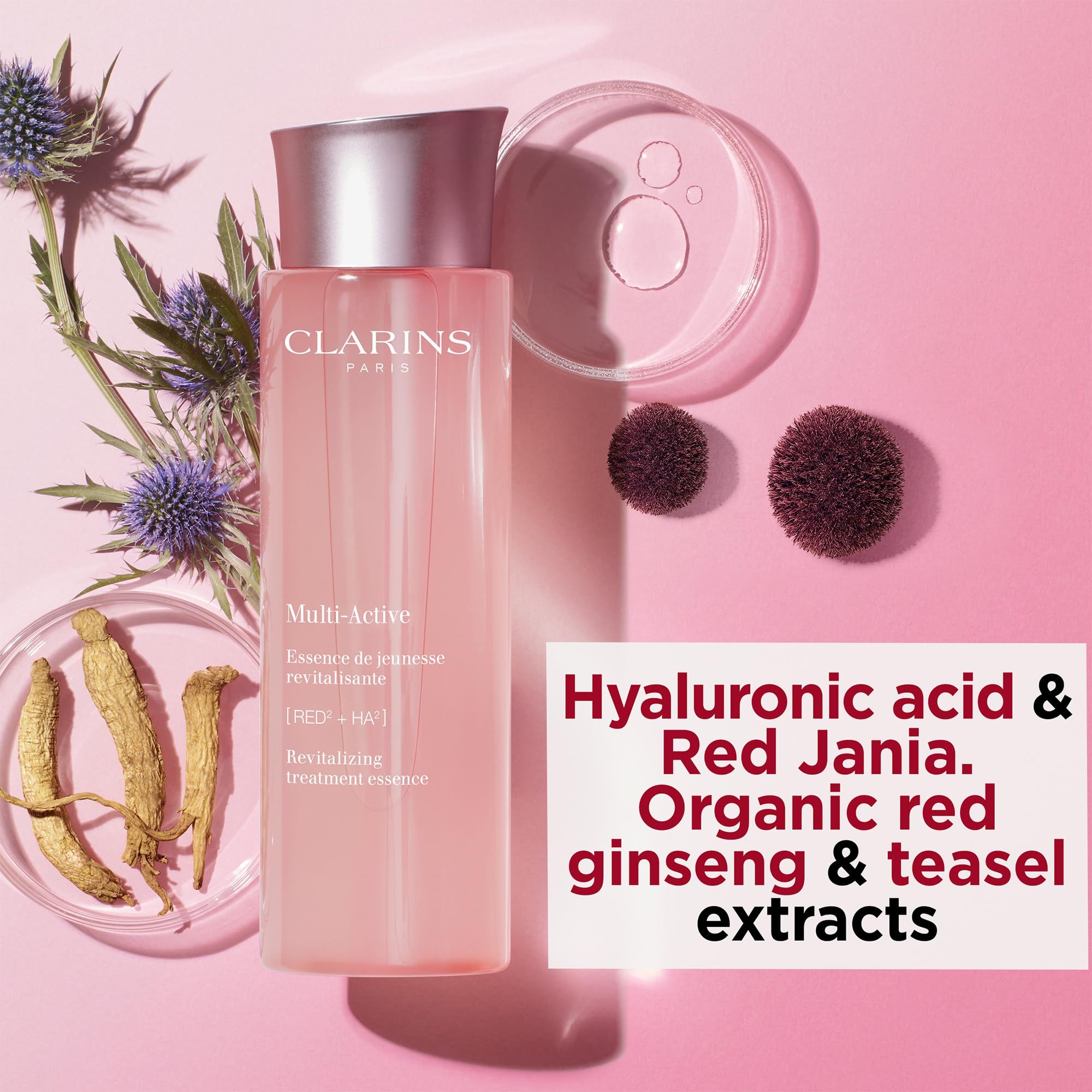 Essenza Clarins Multi-Active. Flacone rosa con tappo argento. Testo: Multi-Active, Revitalizing treatment essence. Ingredienti: estratti.