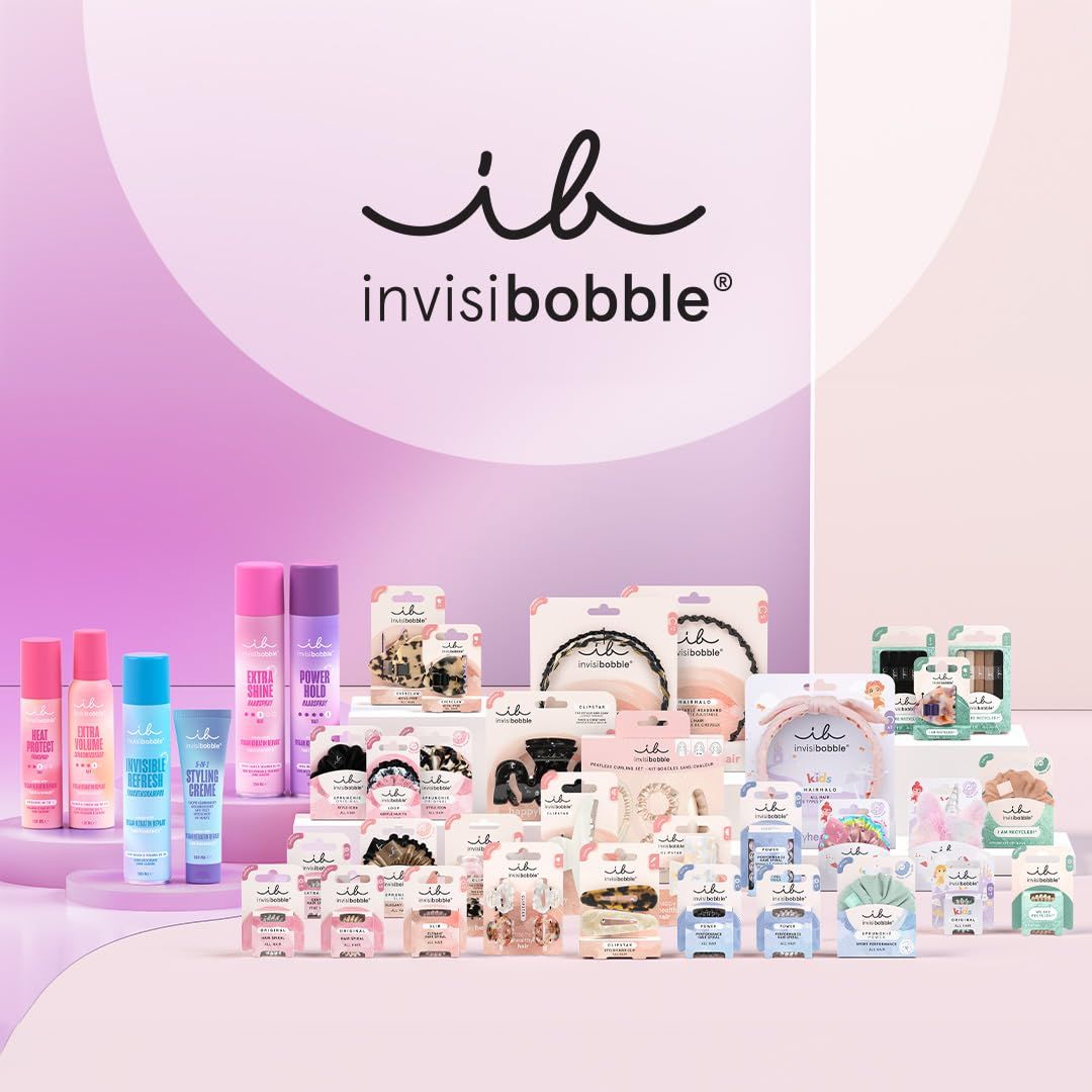 Vari prodotti del marchio 'invisibobble'. Elastici per capelli, fasce, spray, creme, ecc. in vari colori.